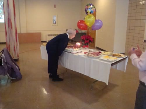 grandma blowing out candles