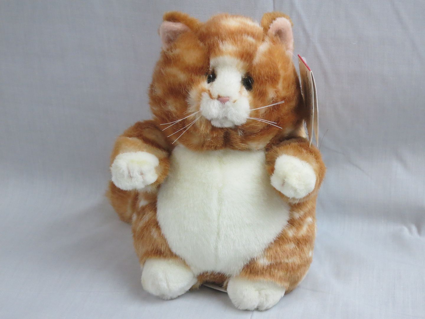 stuffed orange tabby cat