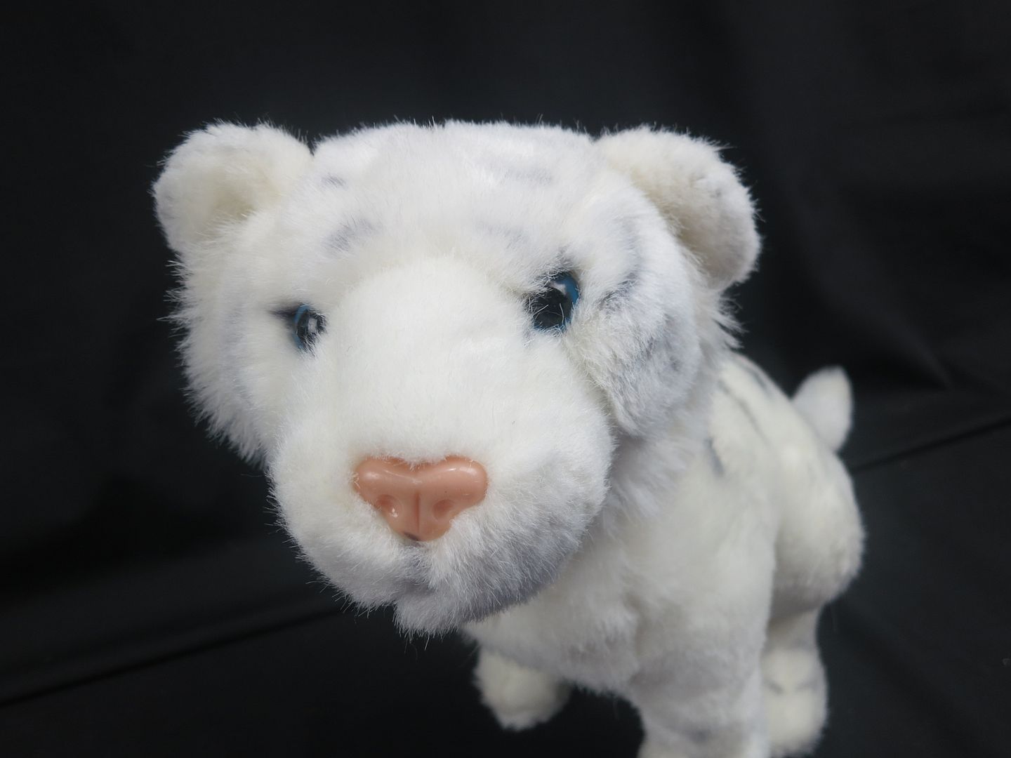 stuffed white tiger with blue eyes