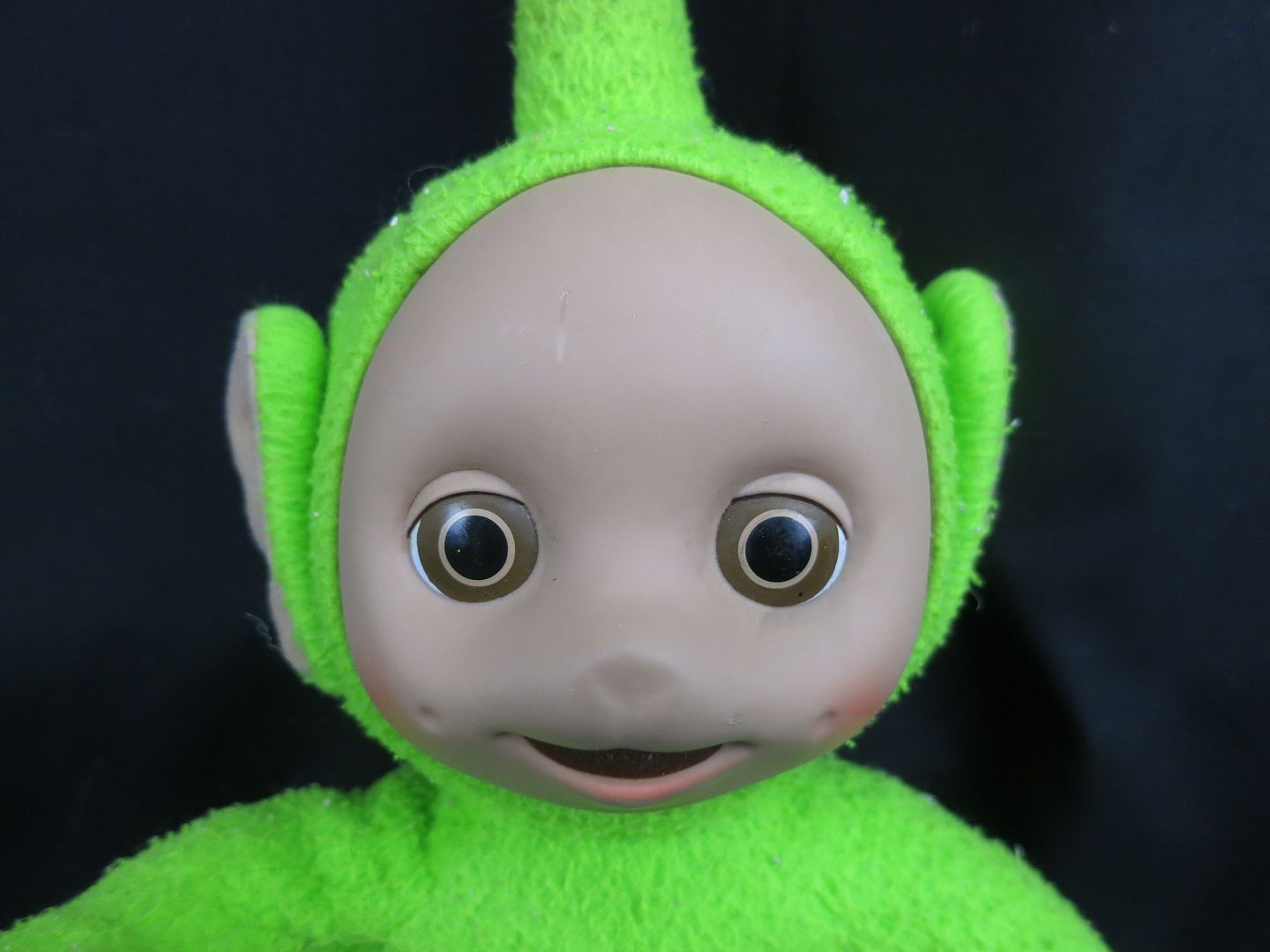 green teletubby toy