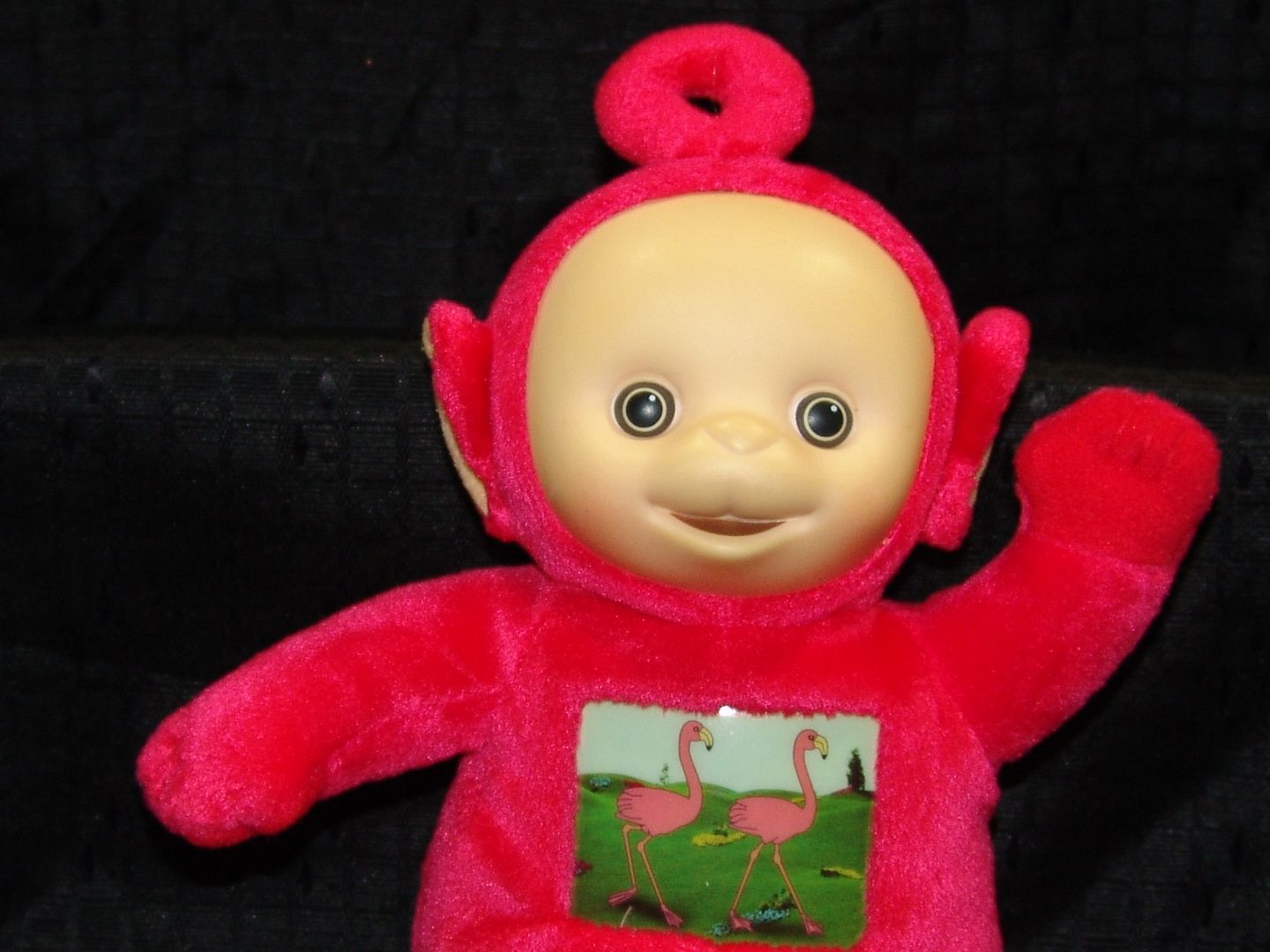 red teletubby toy