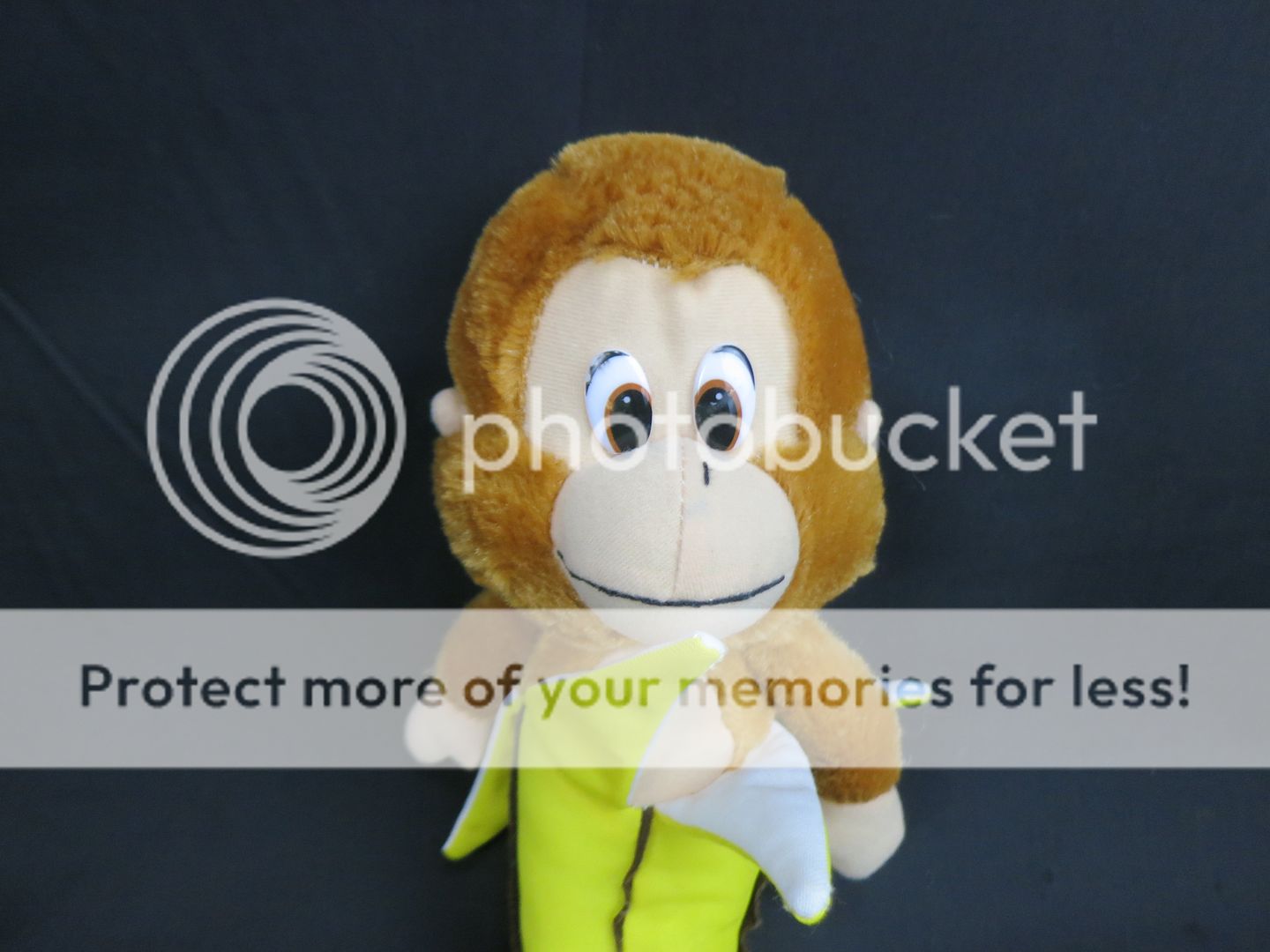 stuffed monkey with banana