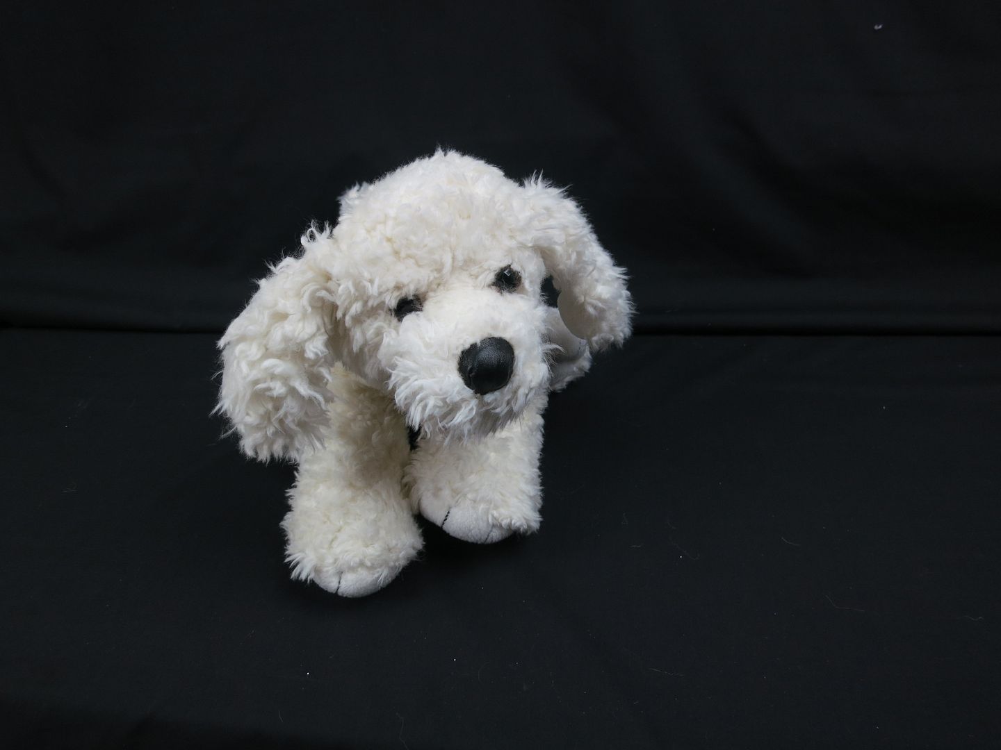 stuffed white puppy