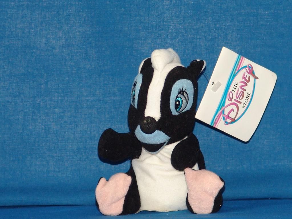 flower the skunk stuffed animal