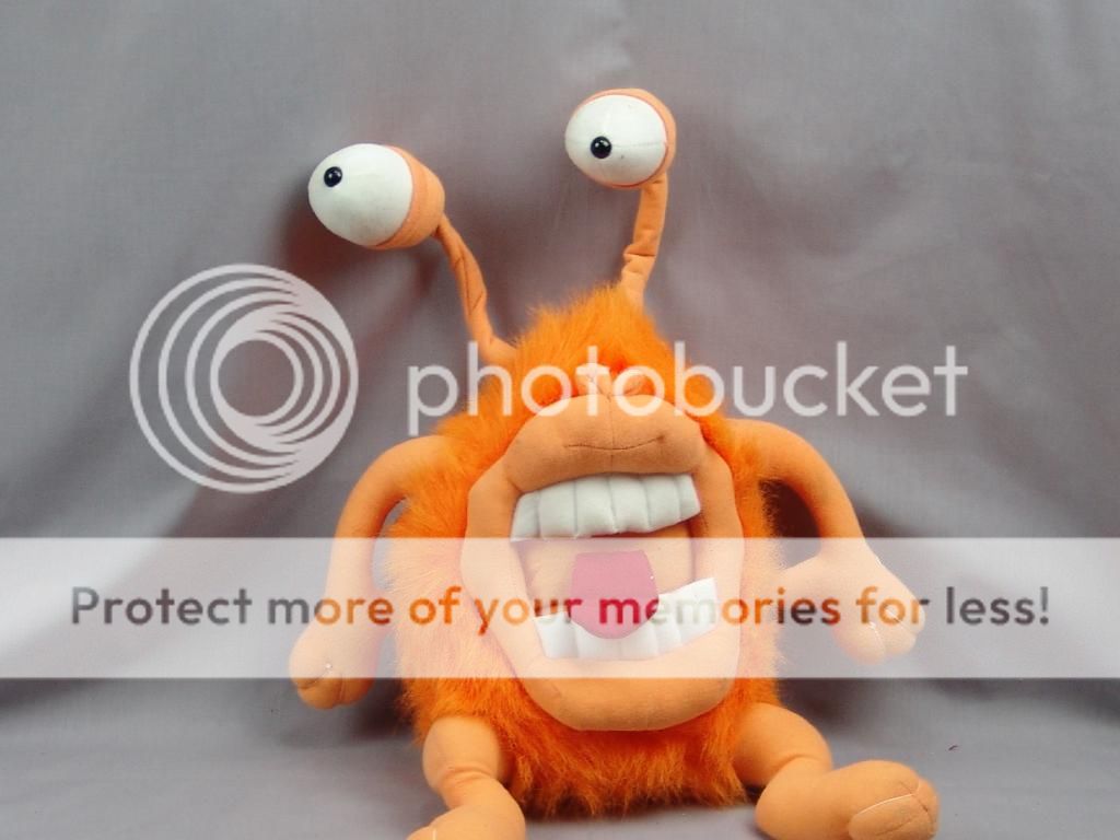 Big Crazy Orange Fuzzy Bug Eyed Monster Poseable Plush Stuffed Animal 